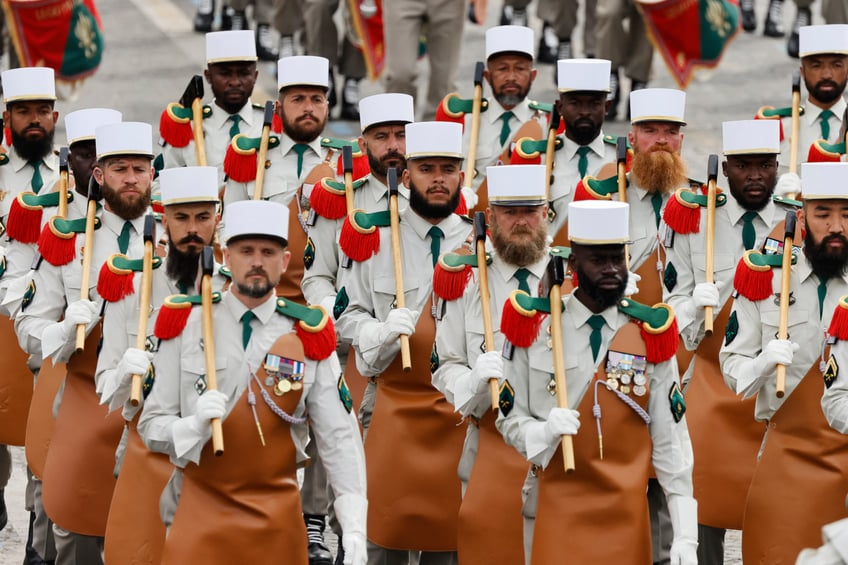 Pioneers of the French Legion Etrangere march past during the Bastille Day military parade along the Avenue Foch in Paris on July 14, 2024. (Photo by Ludovic MARIN / AFP) (Photo by LUDOVIC MARIN/AFP via Getty Images)