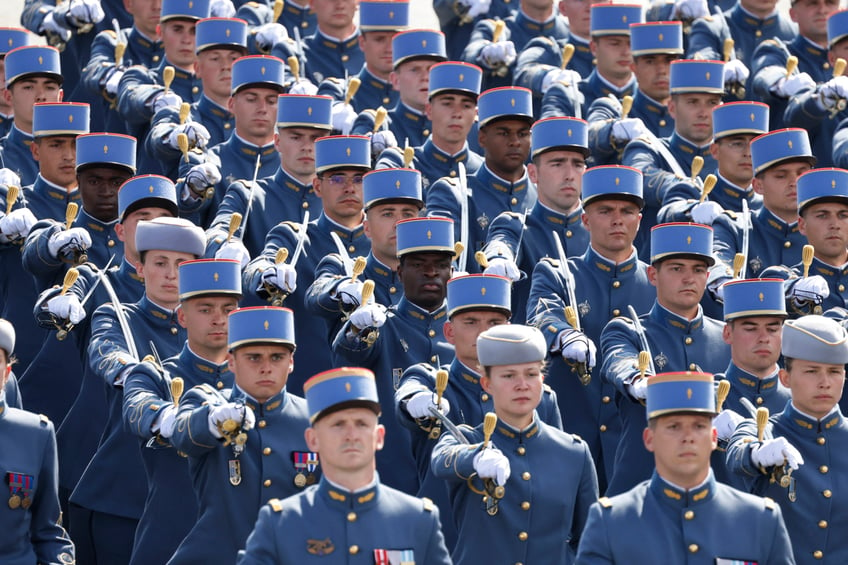 Members of the French Midshipmen's military School of Coetquidan march past during the Bastille Day military parade along the Avenue Foch in Paris on July 14, 2024. (Photo by Ludovic MARIN / AFP) (Photo by LUDOVIC MARIN/AFP via Getty Images)