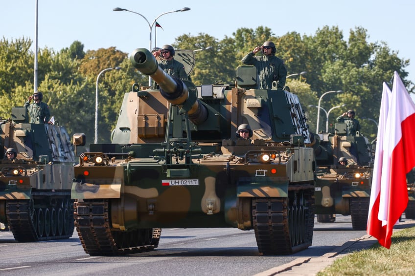 pictures poland vows to defend natos eastern border at army day parade