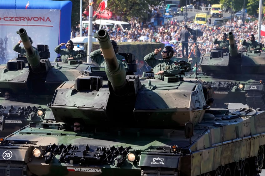 pictures poland vows to defend natos eastern border at army day parade