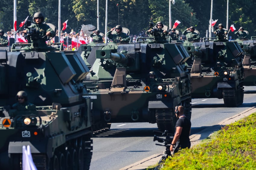 pictures poland vows to defend natos eastern border at army day parade