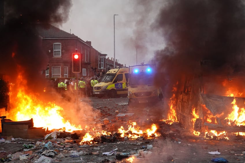 pictures riots in england after mass stabbing left three children dead