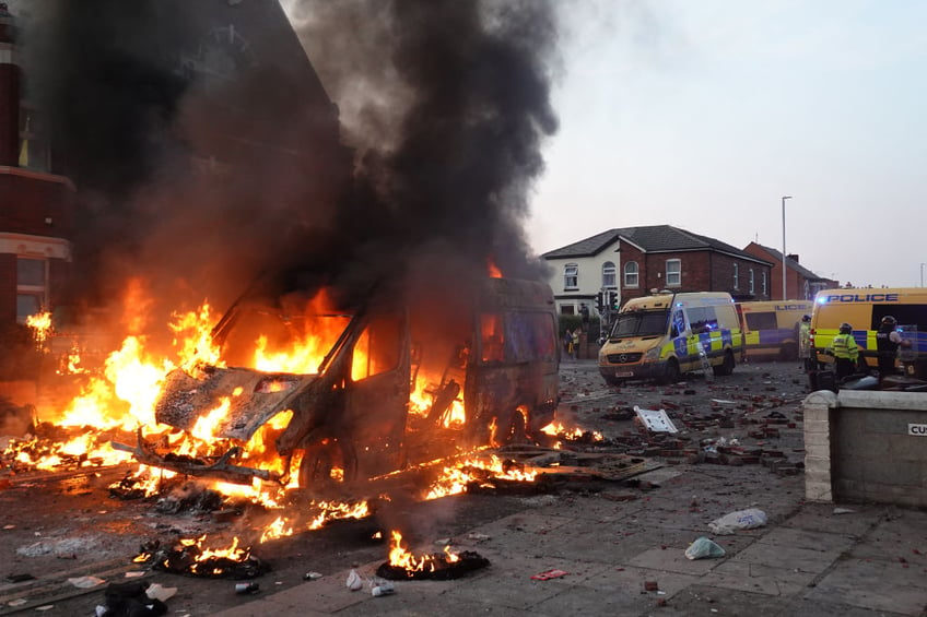 pictures riots in england after mass stabbing left three children dead