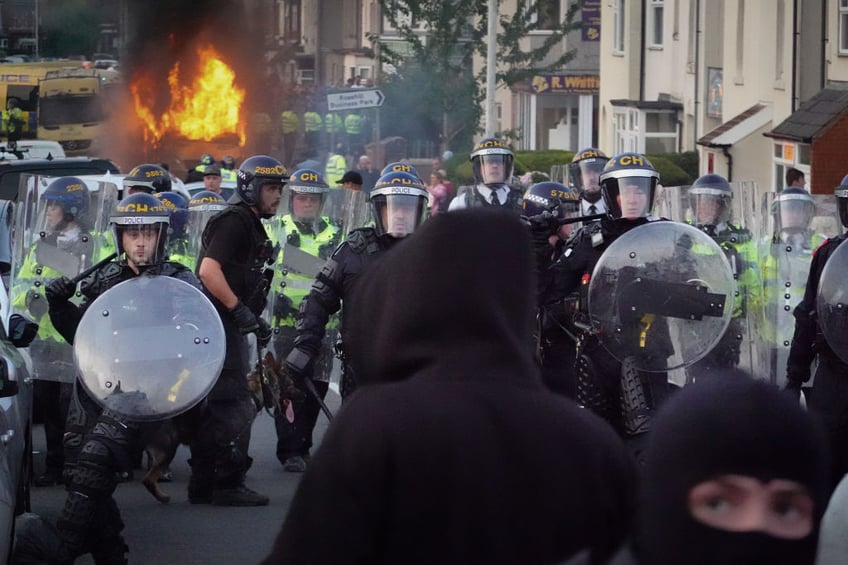 pictures riots in england after mass stabbing left three children dead