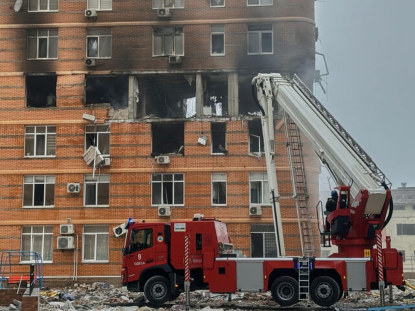 ODESA, UKRAINE - DECEMBER 29: A rocket hit a residential building in the morning in the city limits on December 29, 2023 in Odesa, Ukraine. Russia launched missile attacks targeting major Ukrainian cities including the capital Kyiv, Lviv, eastern Dnipro, Odesa and Kharkiv. Russia attacked Ukraine with 122 missiles and …