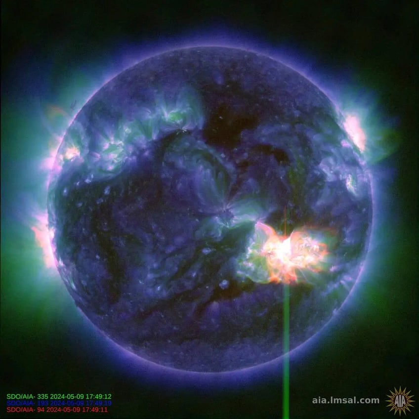 This image provided by NASA shows a solar flare, as seen in the bright flash in the lower right, captured by NASA’s Solar Dynamics Observatory on May 9, 2024. A severe geomagnetic storm watch has been issued for Earth starting Friday and lasting all weekend _ the first in nearly 20 years. (NASA/SDO via AP)