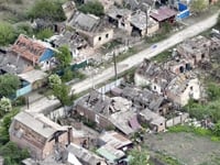 Pictures: Ukrainian Village Battered as Russian Forces Advance
