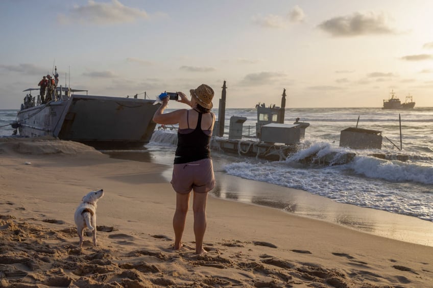 pictures us army vessels beached as heavy seas hit gaza aid deliveries