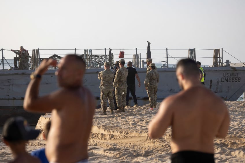 pictures us army vessels beached as heavy seas hit gaza aid deliveries