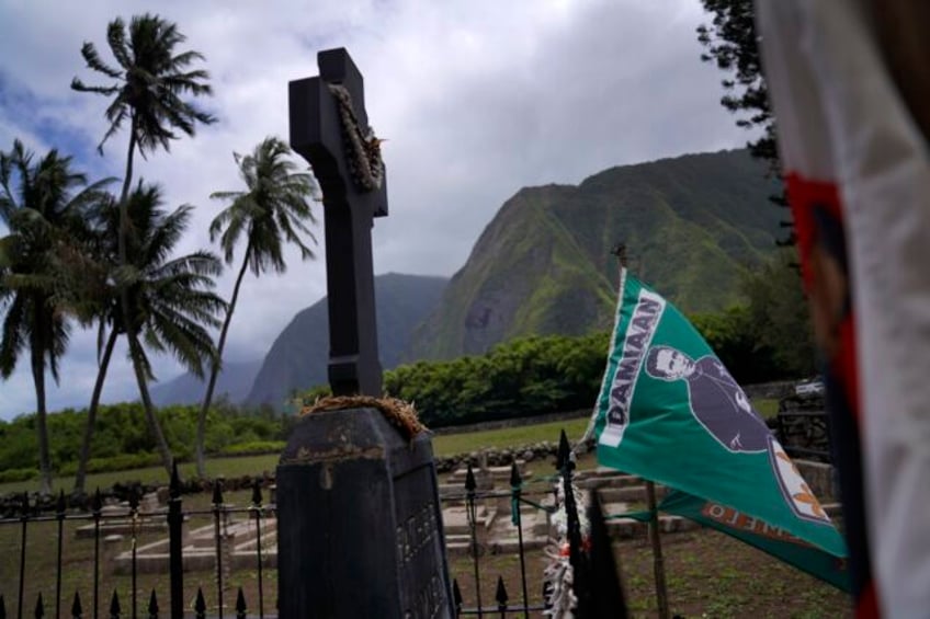 pilgrims yearn to visit isolated peninsula where catholic saints cared for hawaiis leprosy patients