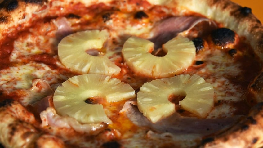 A Hawaiian pizza from Lupa Pizza is made with pineapple and ham as toppings.