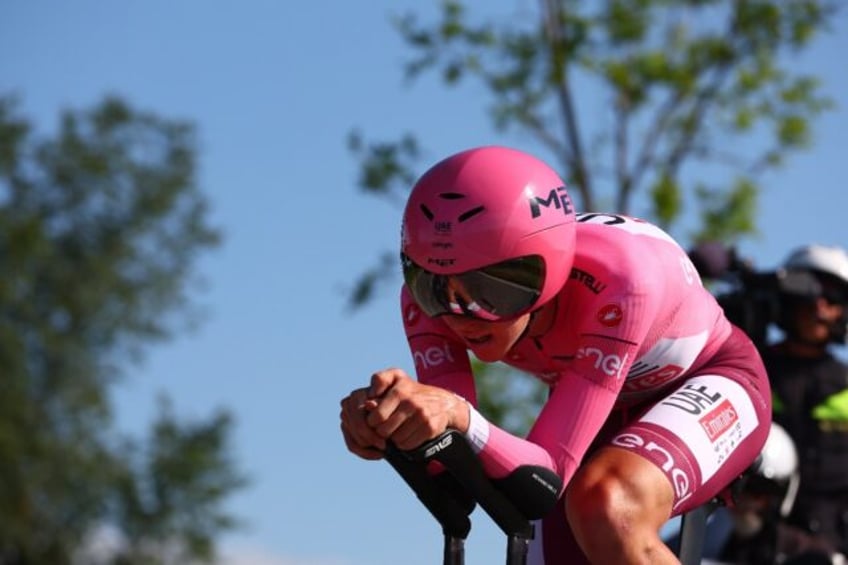 Slovenian rider Tadej Pogacar racing to Lake Garda on stage 14