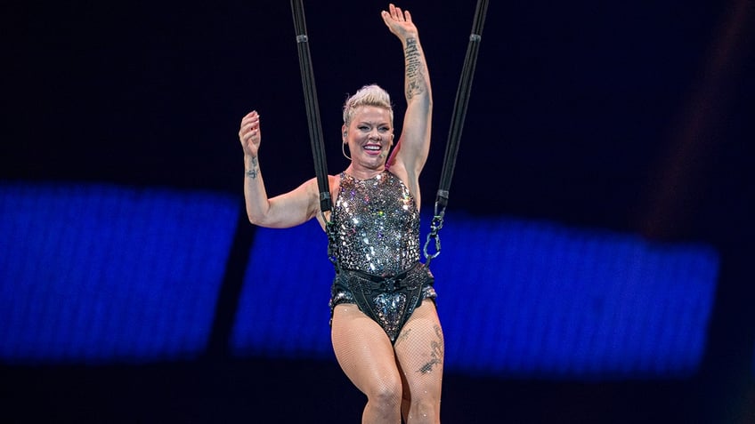 Pink performing aerial stunts