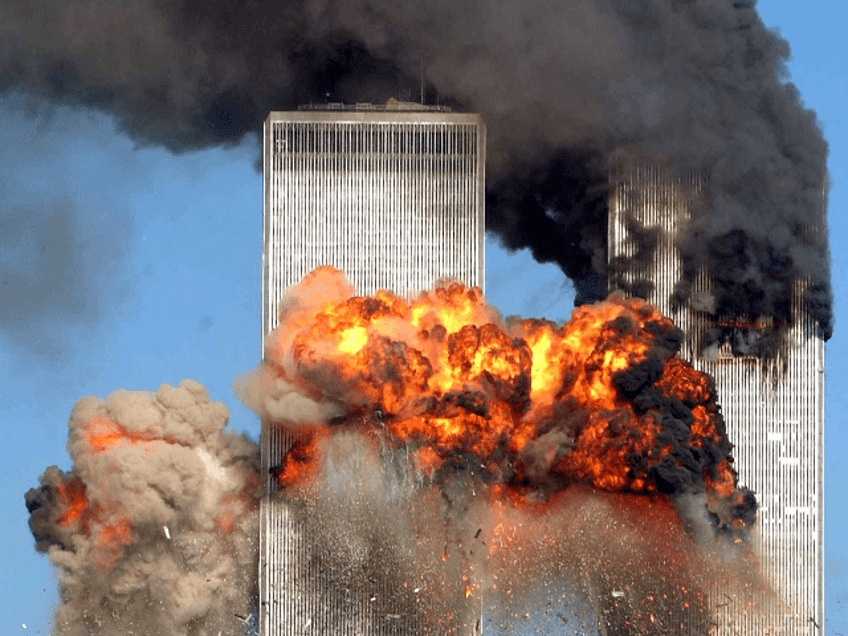 Hijacked United Airlines Flight 175 from Boston crashes into the south tower of the World Trade Center and explodes at 9:03 a.m. on September 11, 2001 in New York City. The crash of two airliners hijacked by terrorists loyal to al Qaeda leader Osama bin Laden and subsequent collapse of the twin towers killed some 2,800 people. (Photo by Spencer Platt/Getty Images)