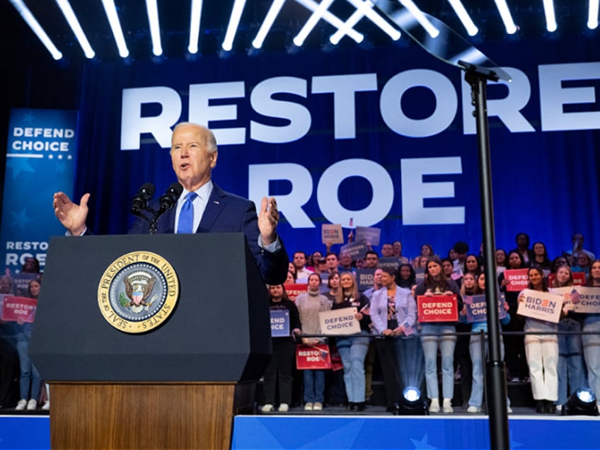 US President Joe Biden speaks during a campaign rally to Restore Roe at Hylton Performing Arts Center in Manassas, Virginia, on January 23, 2024. Protesters chanting slogans against Israel's offensive in Gaza repeatedly interrupted US President Joe Biden on Tuesday during an election campaign event to promote abortion rights. (Photo by SAUL LOEB / AFP) (Photo by SAUL LOEB/AFP via Getty Images)