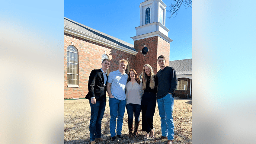 Ree Drummond outside of church with two sons Todd and Bryce, daughter Paige, and her boyfriend