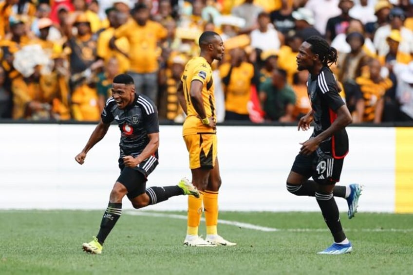 Thabiso Lebitso (L) celebrates scoring for Orlando Pirates in the Soweto derby against Kai