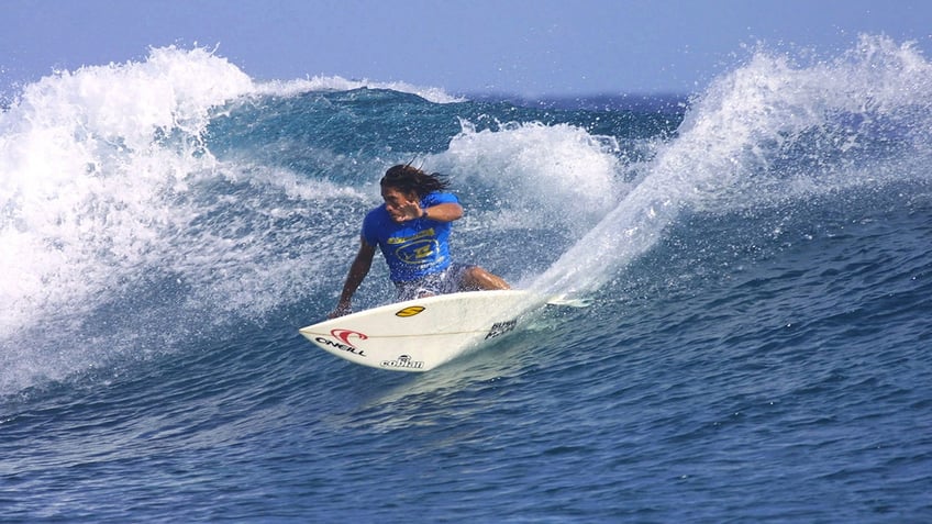 Tamayo Perry surfing