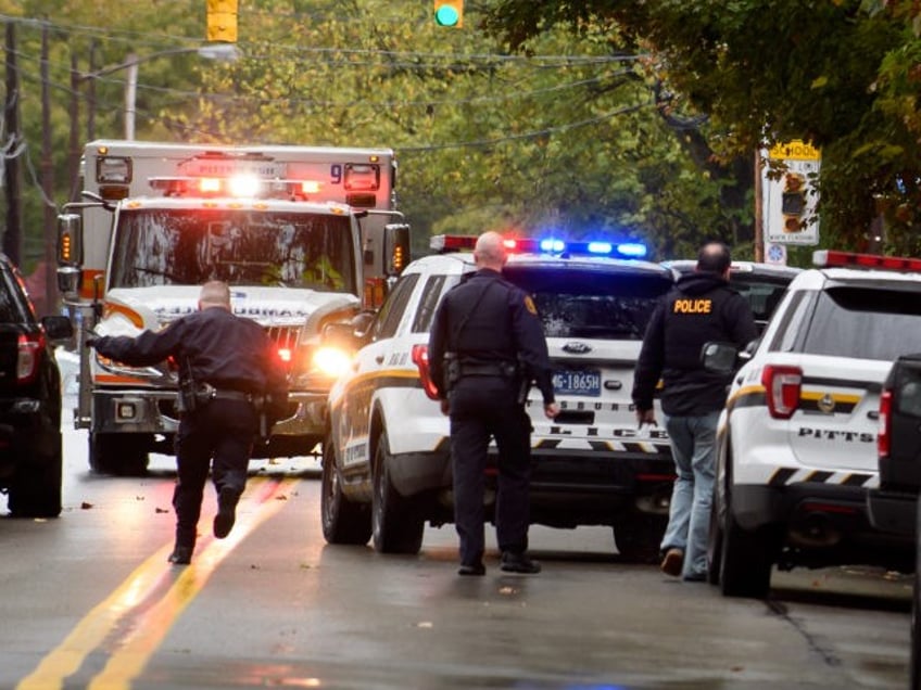 pittsburgh police circle building after man opens fire to avoid eviction