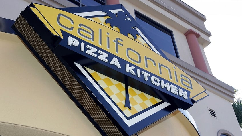 California Pizza Kitchen sign outside restaurant.