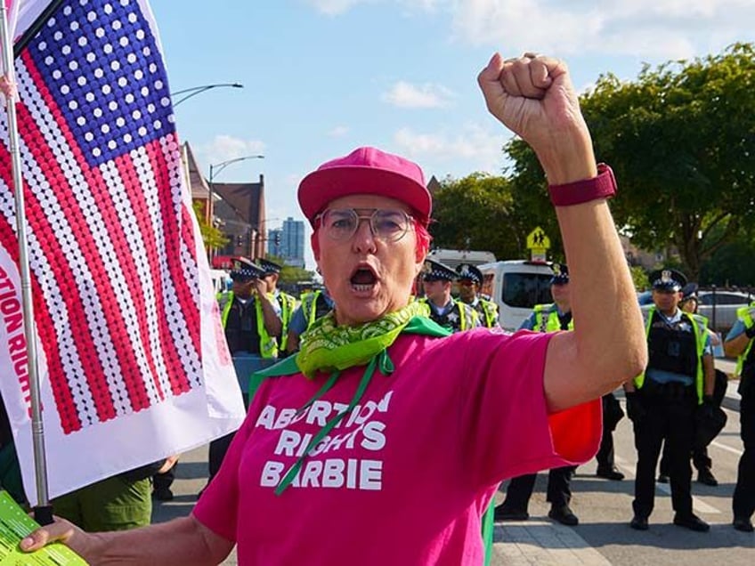 A pro-abortion activist rallies during the 2024 Democratic National Convention in Chicago,