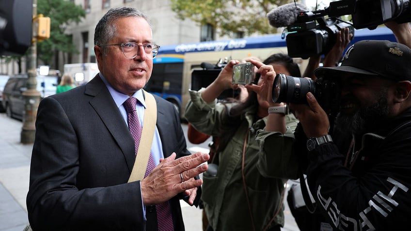 Marc Agnifilo speaks with media members outside United States Court in Manhattan after music mogul Sean "Diddy" Combs was arrested