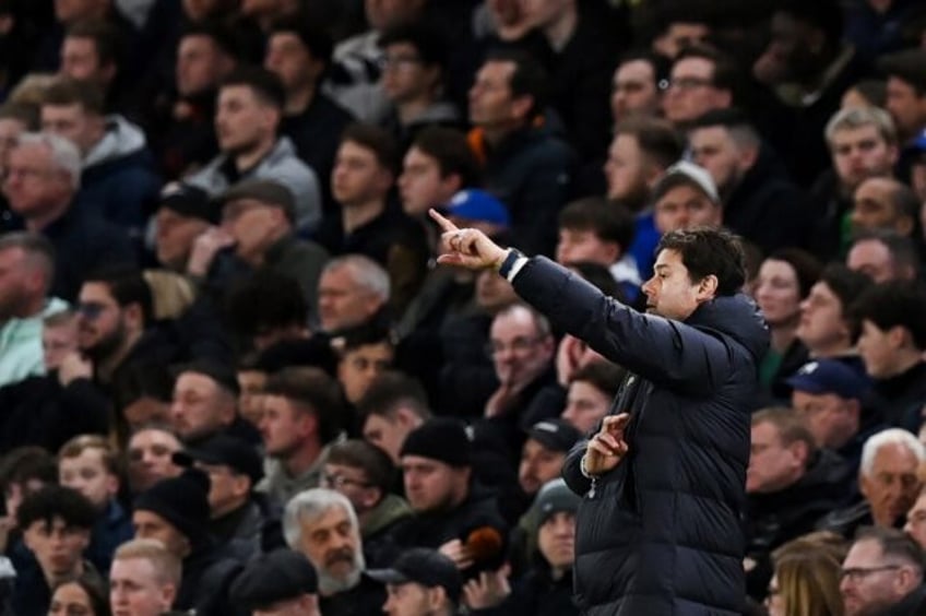 Pointing the way to victory: Chelsea boss Mauricio Pochettino signals to his side during t