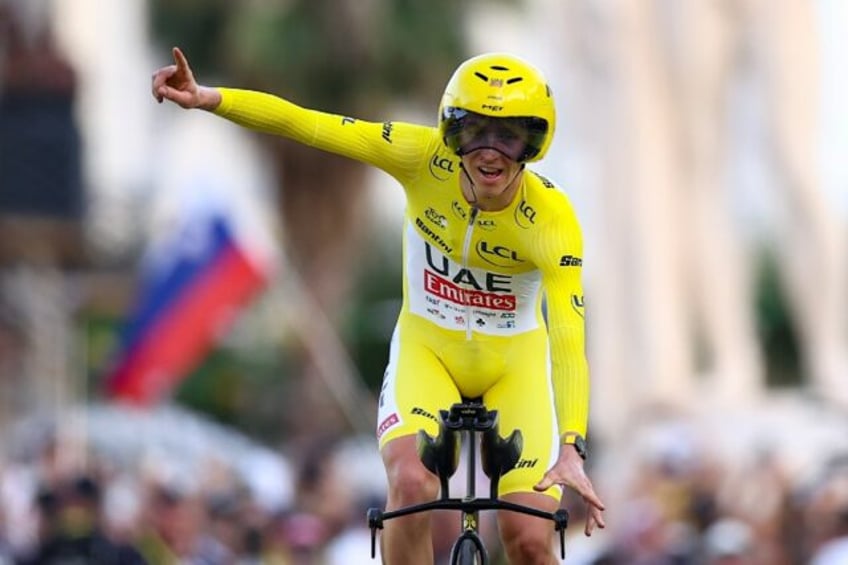 Slovenian rider Tadej Pogacar winning the 2024 Tour de France, also winning stage 21 at Ni