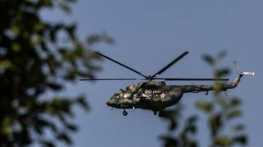 poland builds up troops on border in response to alleged belarus combat helicopter breach