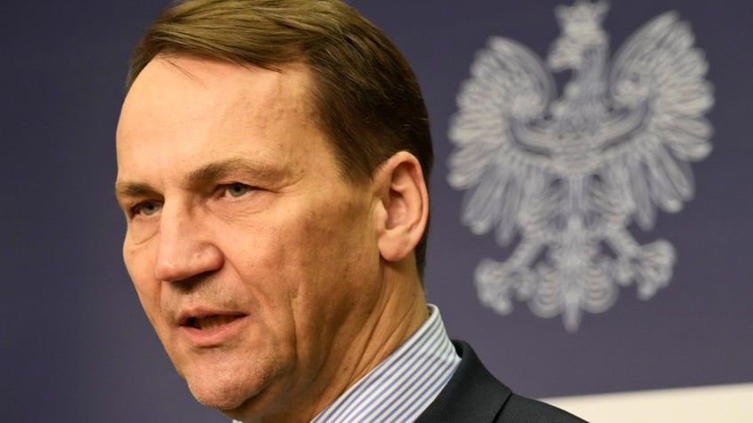 Poland's Foreign Minister Radek Sikorski addresses reporters at the Foreign Ministry in Warsaw, Poland.