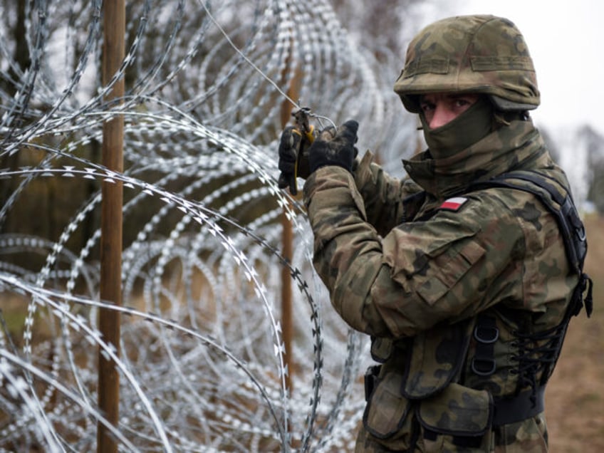 WISZTYNIEC, WARMIAN-MASURIAN, POLAND - 2022/11/03: A Polish soldier seen working at the co