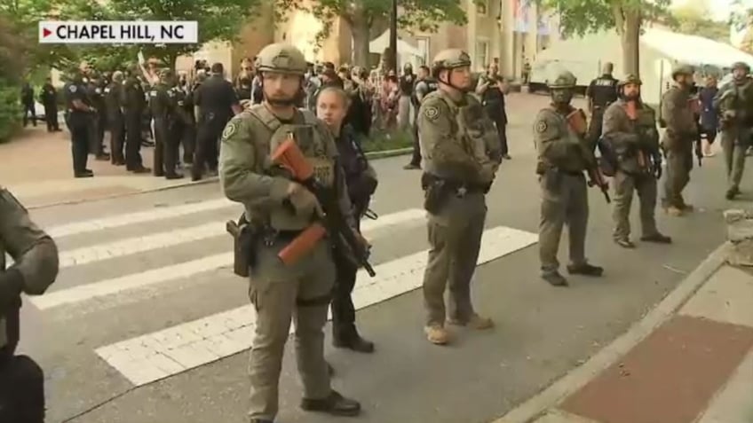 guards stand during UNC protest