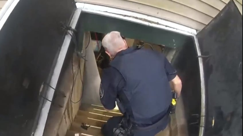 Colchester, Connecticut, police enter Jared Billard's basement apartment.