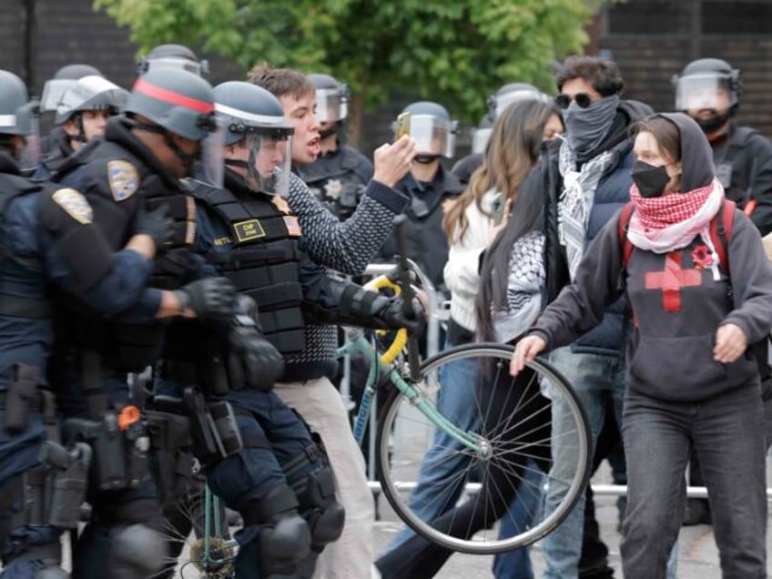 Local police and California Highway Patrol keep more protesters away with barricades as th