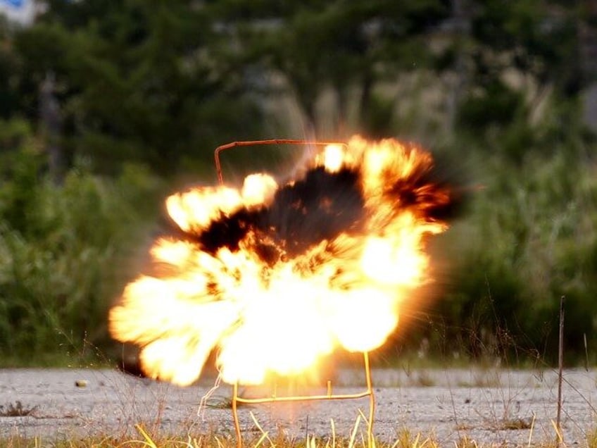 A sheet explosive hidden in a mailing envelope is detonated during a live explosives demon