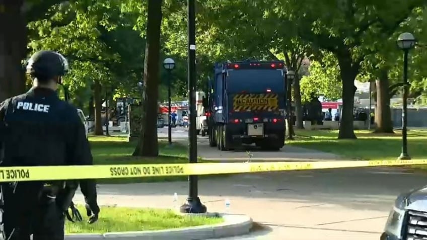 police cleaning up encampment