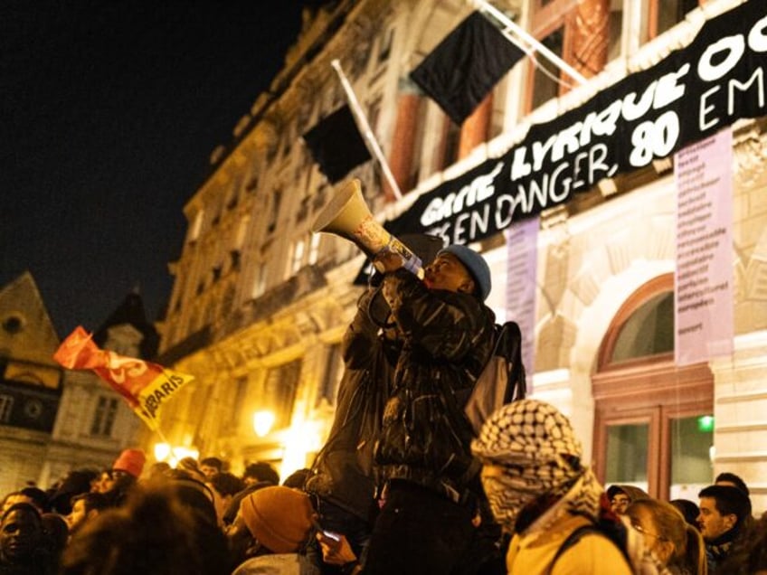 Hundreds of people gather in front of the Gaite Lyrique in Paris, France, on March 17, 202