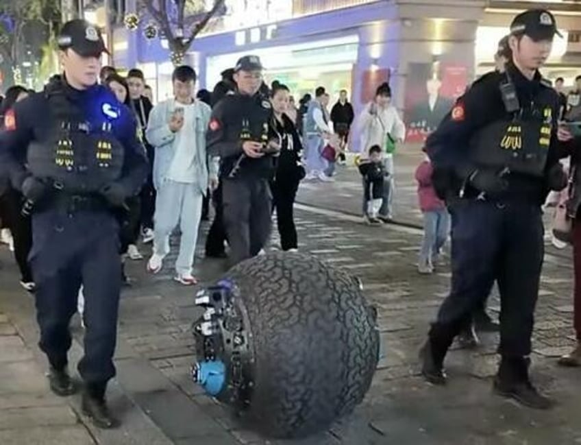 police in china test indestructible ball shaped robot that can identify and chase suspects