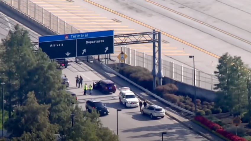 police investigate bomb threat at bwi airport terminal suspect in custody reports