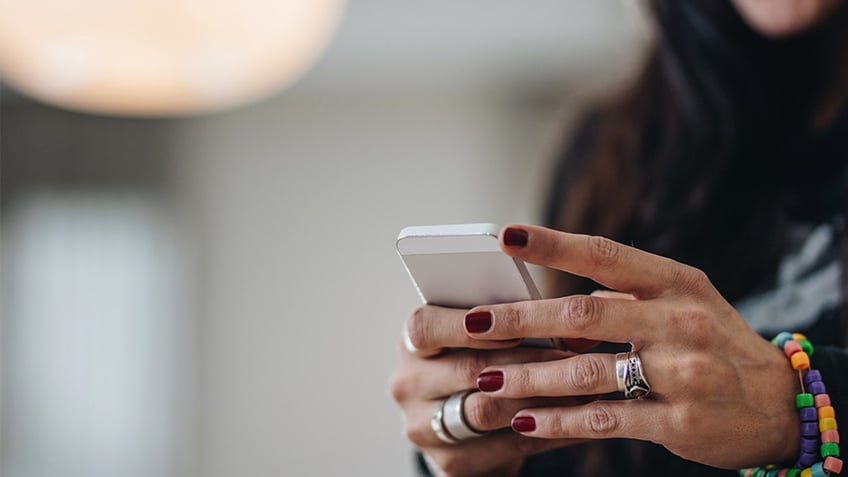 Female using cell phone