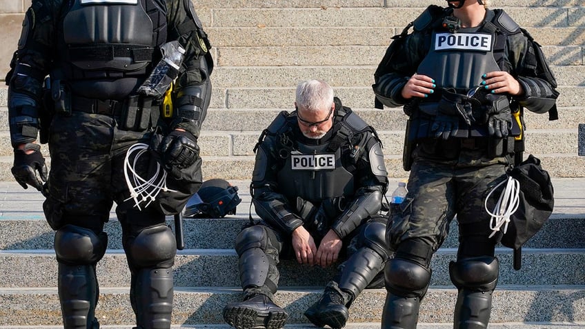 Police in riot gear outside the Kenosha County Court House