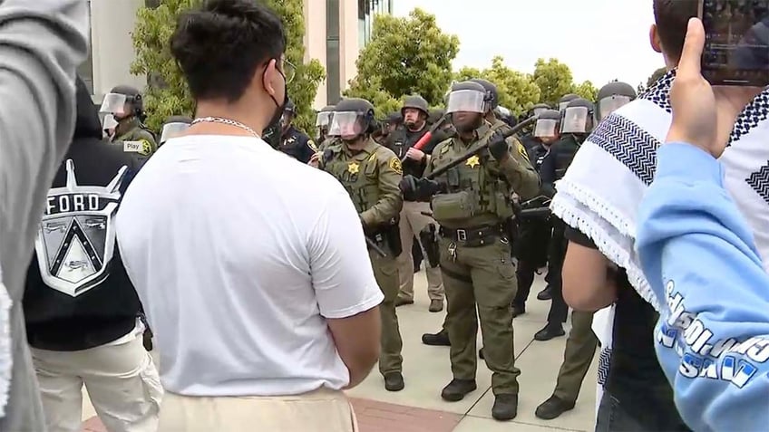 police on uc irvine campus after anti israel agitators swarm buildings students told to shelter in place