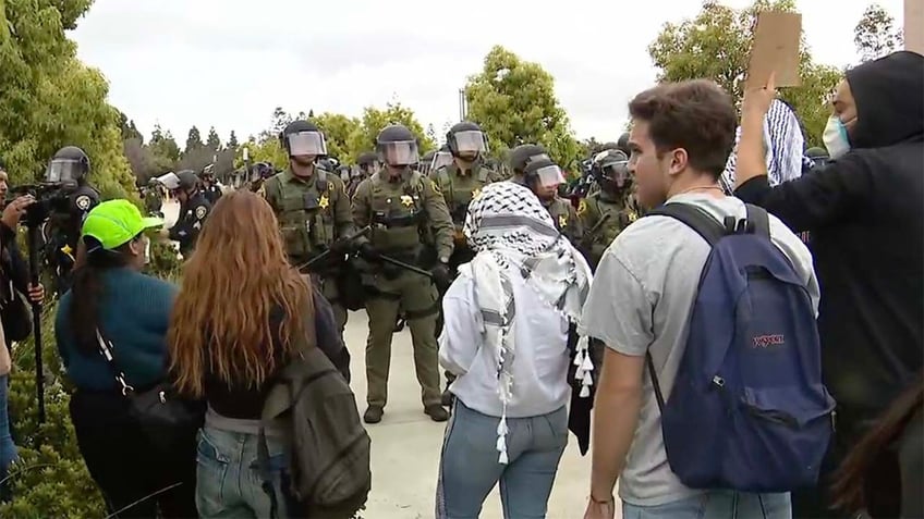 police on uc irvine campus after anti israel agitators swarm buildings students told to shelter in place