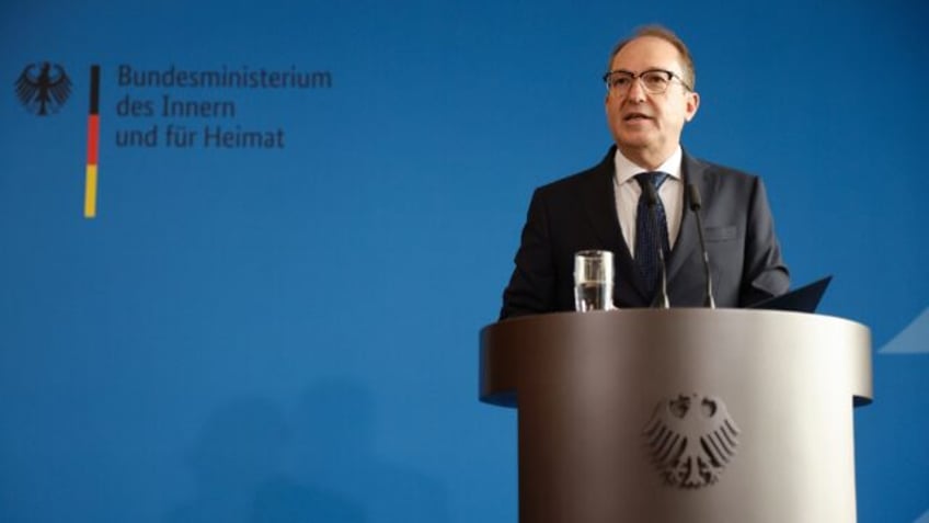 German Interior Minister Alexander Dobrindt addresses a press conference in Berlin
