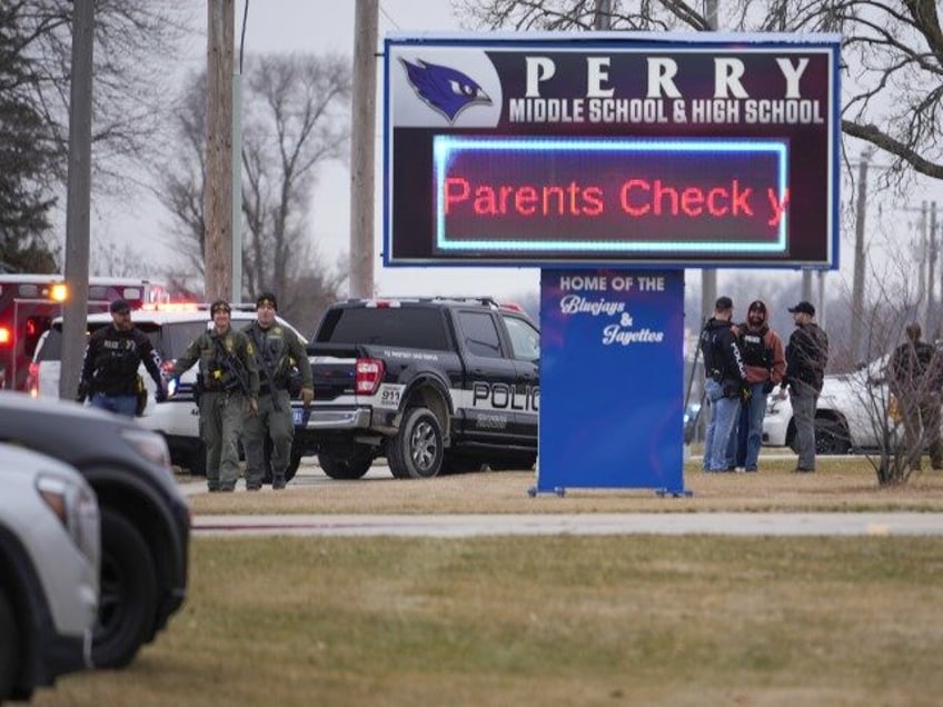 Police respond to Perry High School in Perry, Iowa., Thursday, Jan. 4, 2024. Police say there has been a shooting at the city's high school.(Andrew Harnik/AP)