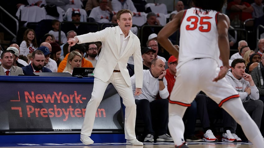 Rick Pitino courtside