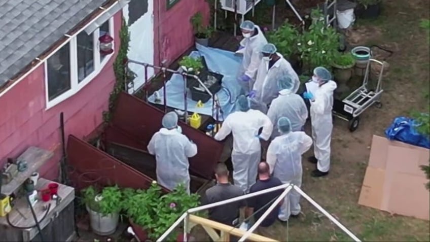 police seen swarming basement at architects ramshackle home in gilgo beach serial killer probe