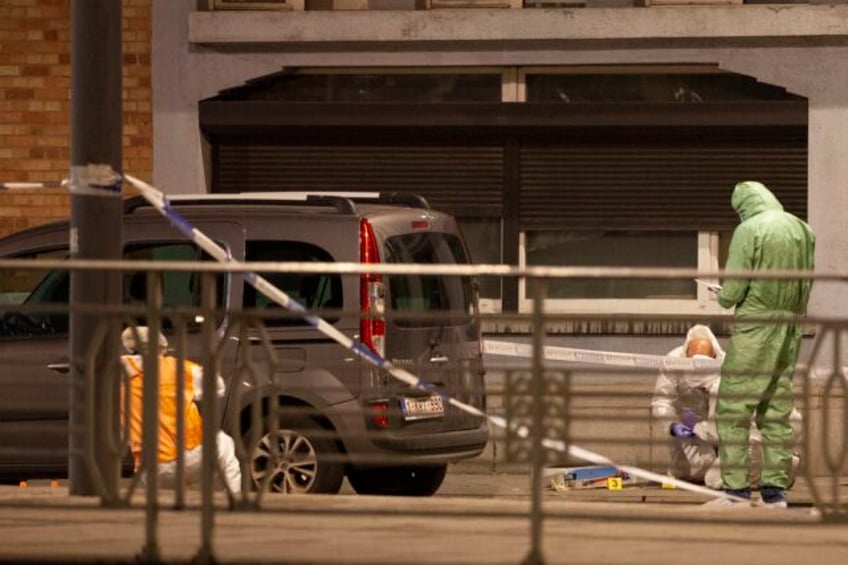 police shoot dead suspected extremist accused of killing 2 swedish soccer fans on a brussels street