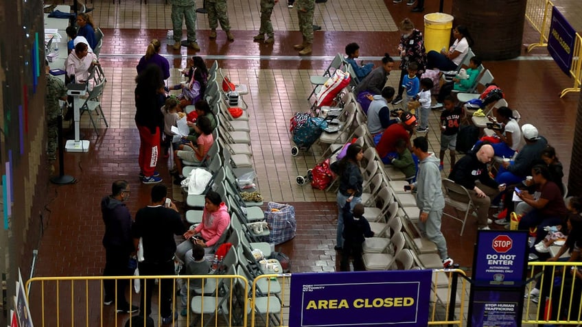 Migrants in NYC bus terminal