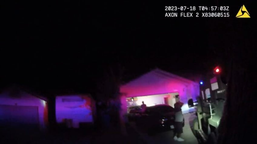 police videos show swat officers detaining man woman during home raid in tupac shakur cold case